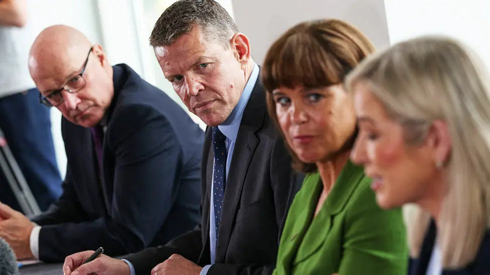 Michelle O'Neill, Mary Lou McDonald, Rhun ap Iorwerth and John Swinney at a press conference, sitting at a table
