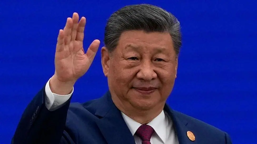 Chinese President Xi Jinping waves as he arrives at the opening ceremony for the World AI Conference on July 17, 2026 in Shanghai, China.