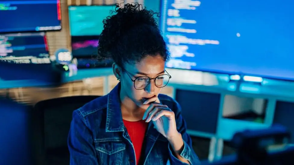 Woman works at her computer