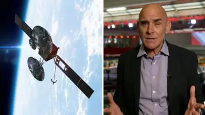 Satellite hovering over the blue planet Earth and Jonathan Beale