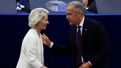 Von der Leyen, Metsola and Carney in front of Canadian and EU flags