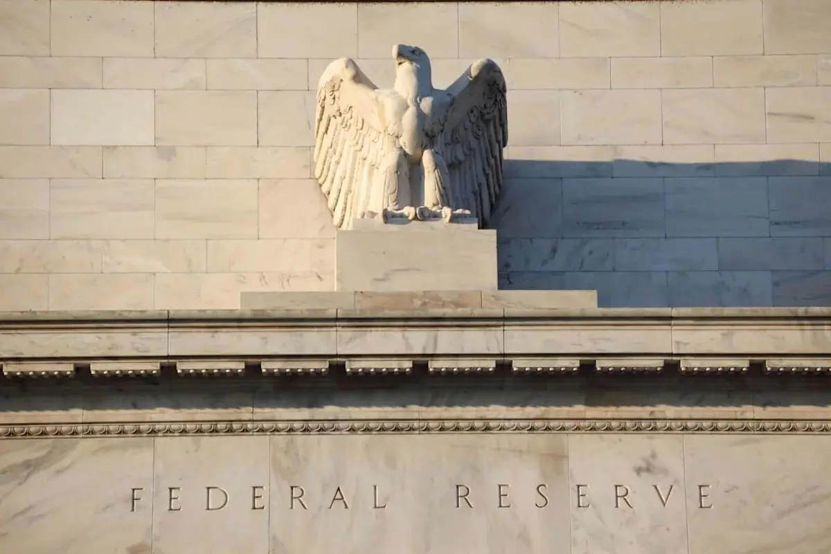 Stocks Hold Gains After Fed Hikes Key Rate
