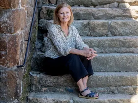 Lucy Layton sitting on some steps