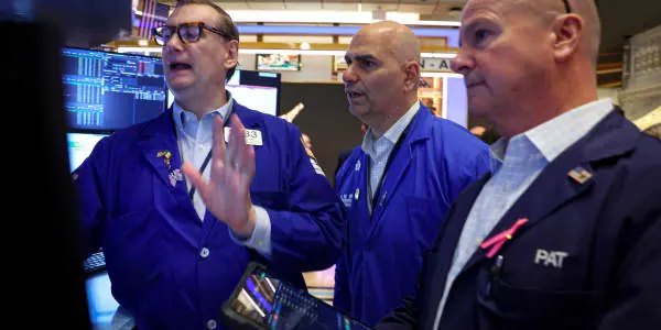 Nasdaq jumps 2% to close at a record, buoyed by surge in AI stocks, as well as cooling oil and yields