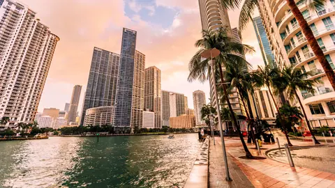 Miami's ultra-luxury housing market booms as cash transactions dominate, high-end brands like Bugatti and Porsche jump in