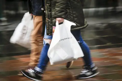 Consumer confidence continues gradual recovery amid household bill concerns
