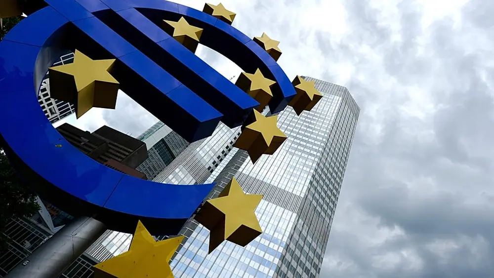 FILE. The Euro sculpture stands in front of the European Central Bank building in Frankfurt, Germany, June 2014