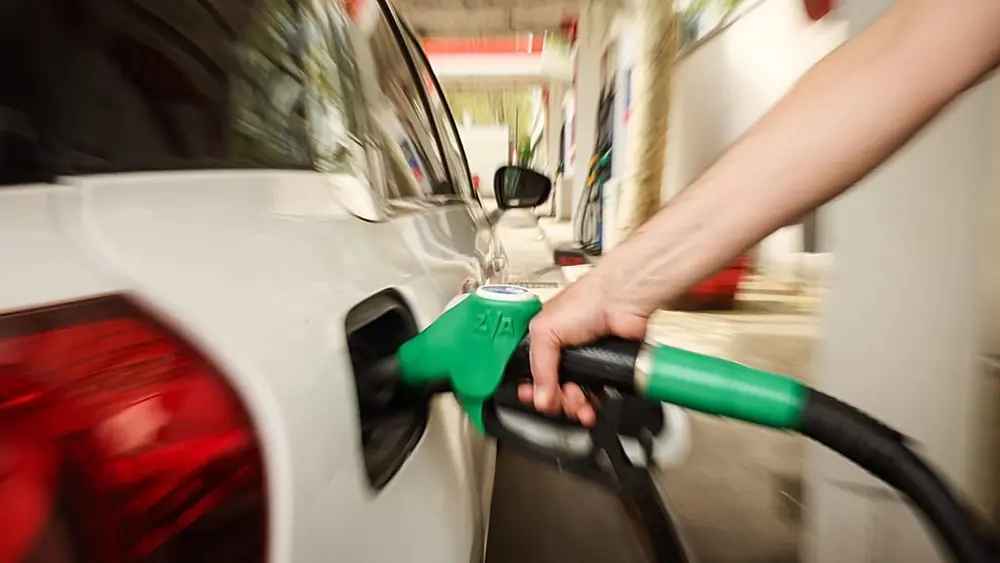 A customer fuels his vehicle at an Essence gas station in Paris, 5 April 2026.