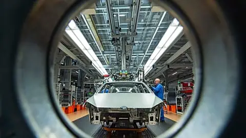 FILE – Workers assemble Volkswagen Golf cars at the company’s plant in Zwickau, Germany, on 22 January 2018.