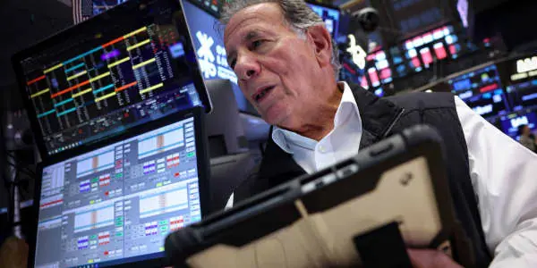 Dow jumps more than 470 points Friday; stocks notch winning week despite Treasury yield surge