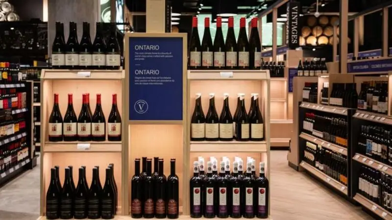 Several bottles of Ontario wine on shelves at the Liquor Control Board of Ontario (LCBO) Queen's Quay store in Toronto, Ontario, Canada. They are on a shelf labled ONTARIO.