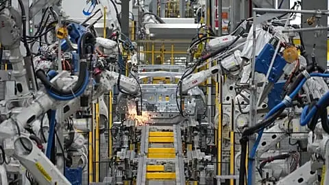 FILE. A car frame is welded by robots at a Vinfast factory in Hai Phong, Vietnam, 29 Sept. 2023