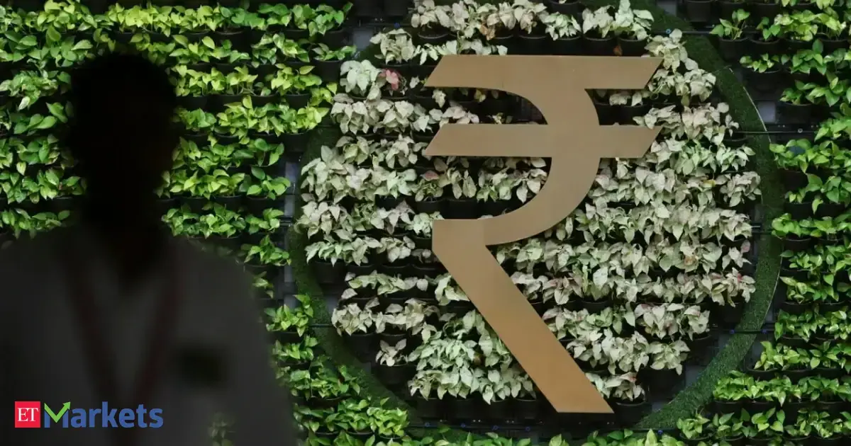 Rupee ends nearly flat as traders remain glued to oil moves, RBI caps fall