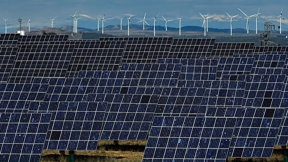 Solar panels work near the small town of Milagro, Navarra Province, northern Spain, on Feb. 24, 2023.