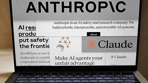 FILE. Pages from the Anthropic website and the company's logos are displayed on a computer screen in New York, 26 Feb. 2026