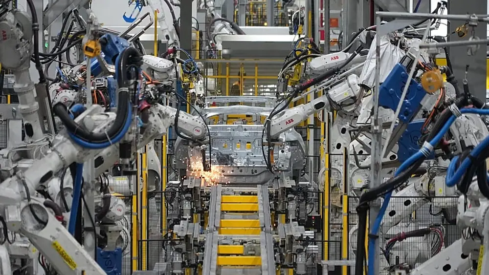 FILE. A car frame is welded by robots at a Vinfast factory in Hai Phong, Vietnam, 29 Sept. 2023