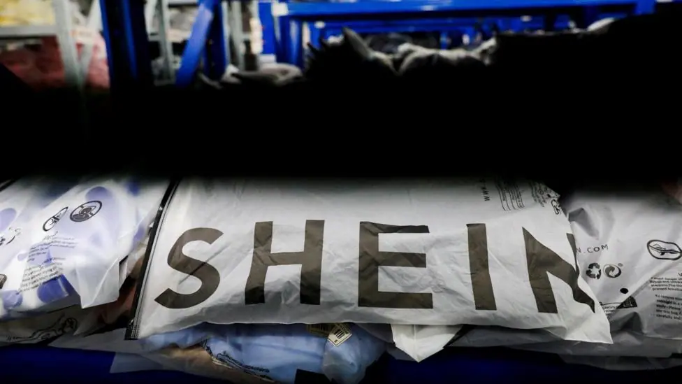 Packs of clothing are displayed at a garment factory for Shein in Panyu District, Guangzhou