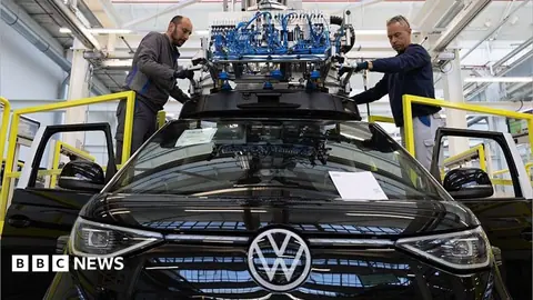 Volkswagen board approves plan to cut another 50,000 jobs