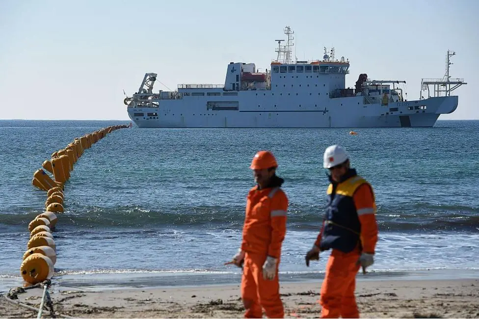 A high-speed submarine cable linking Singapore to France being installed in southern France