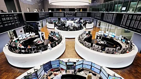 The trading room of the stock market is photographed in Frankfurt, Germany, Tuesday, Feb. 23, 2016