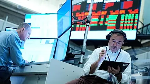 FILE. Justin Kanda works on the floor at the New York Stock Exchange in New York, 14 Sept. 2026