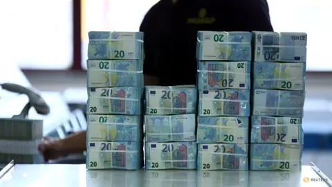 Dollar heads for fourth straight weekly gain versus euro