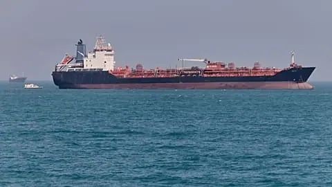 File - An oil tanker sits at anchor in the Strait of Hormuz off Bandar Abbas, Iran, Saturday, 2 May 2026.