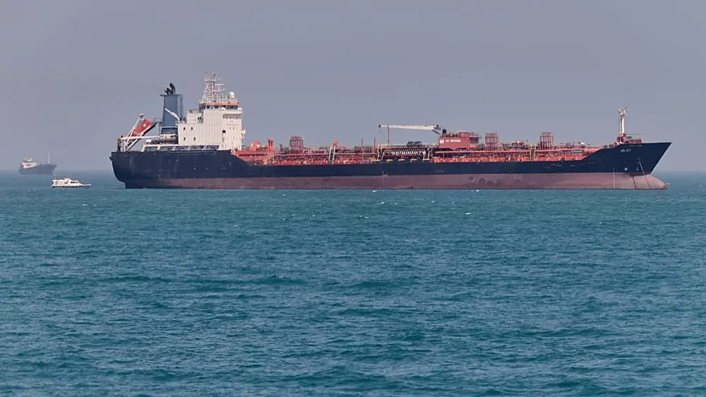 File - An oil tanker sits at anchor in the Strait of Hormuz off Bandar Abbas, Iran, Saturday, 2 May 2026.
