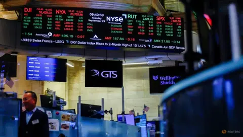 Nasdaq hits record as dollar and Treasury yields climb, oil prices ease