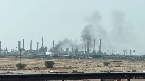 Oil prices rise as storms and air strikes threaten supply