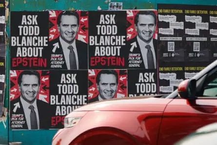 Posters with photos of acting attorney general Todd Blanche with the words ‘Ask Todd Blanche about Epstein’ displayed along a street in Washington DC, on 17 July 2026.