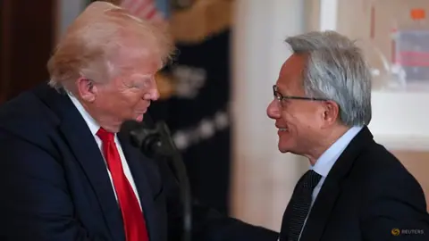 Trump discloses Nvidia stock trades as he prepares to honor CEO Huang