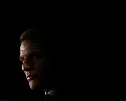 The French president, Emmanuel Macron, closeup looking pensive.