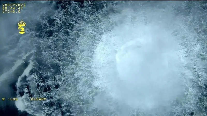 A screen grab from Danish Defense shows a gas leak causes bubbles on the surface of the water at Sea in Sweden on September 30, 2022
