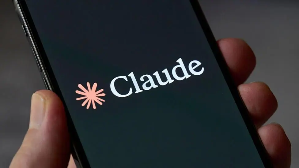 Claude logo on a phone screen. It looks like an orange splash.