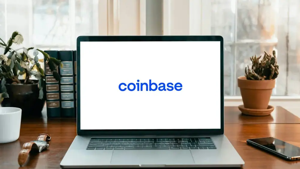 Coinbase logo shown on a laptop screen. (Shutterstock)