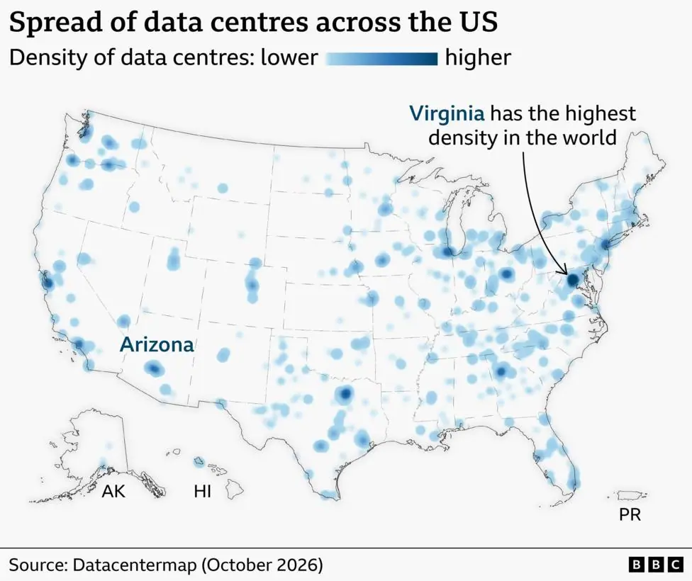 Map of the United States showing the density of data centres using blue shaded clusters, with darker blue indicating higher concentrations. Data centres are spread across the country but are most…