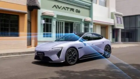 Purple Avatr 06 on a street with blue graphics illustrating its driver assistance sensors' coverage.
