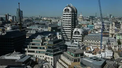 UK economy unexpectedly grows despite fall in consumer spending