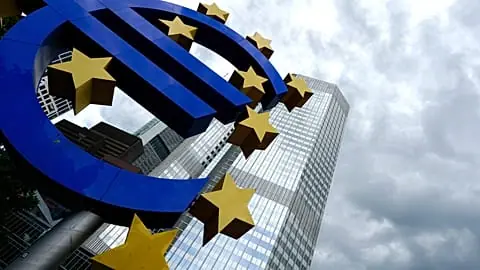 In this June 5, 2014 file picture the Euro sculpture stands in front of the European Central Bank building in Frankfurt, Germany.