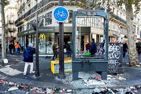 France counts cost of violent protests, as 1,800 arrested