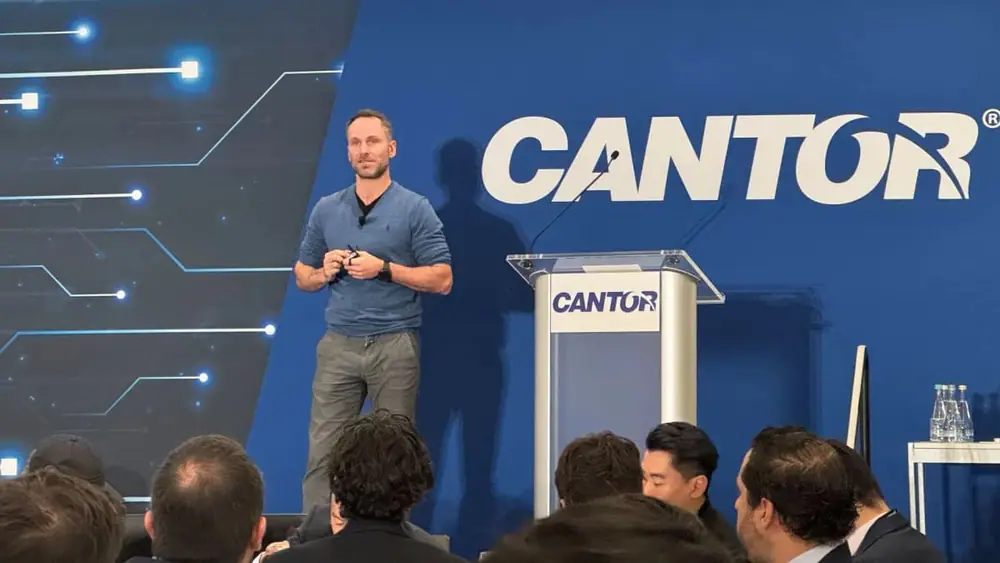 Tether CEO Paolo Ardoino on stage at Cantor Fitzgerald's event in New York (Helene Braun/CoinDesk)