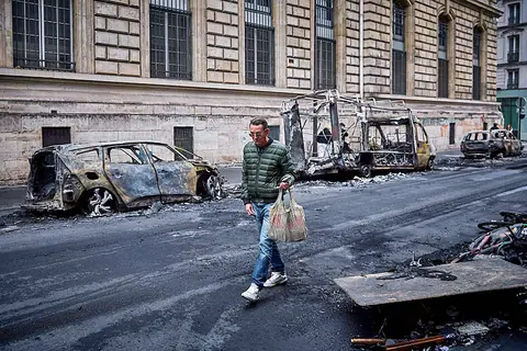 French unrest tapers off after curfews imposed