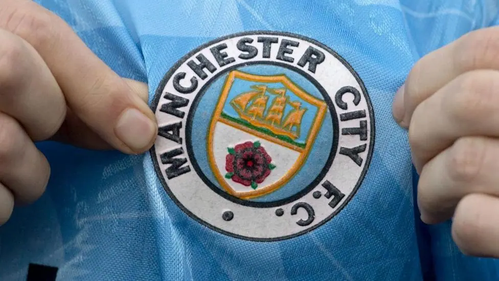 A detailed view of a Manchester City crest before the Premier League 2026/27 match between Crystal Palace FC and Manchester City at Selhurst Park
