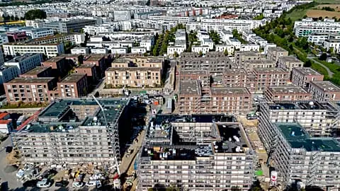 FILE. New apartment houses are under construction in Frankfurt, Germany, 25 Sept. 2023