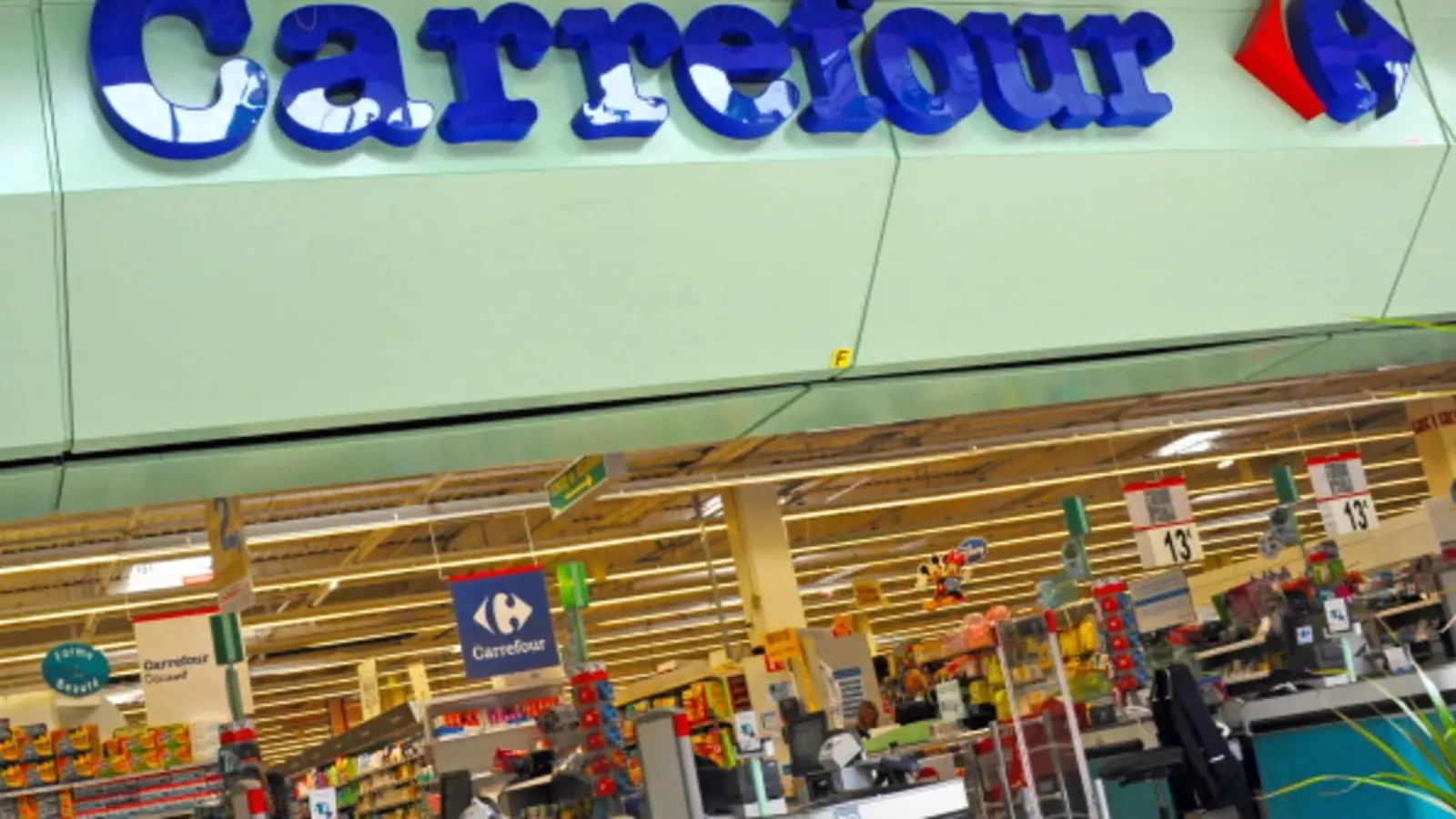 French supermarket giant's shares plunge 14% after warning ‘unprecedented’ unrest will hit business