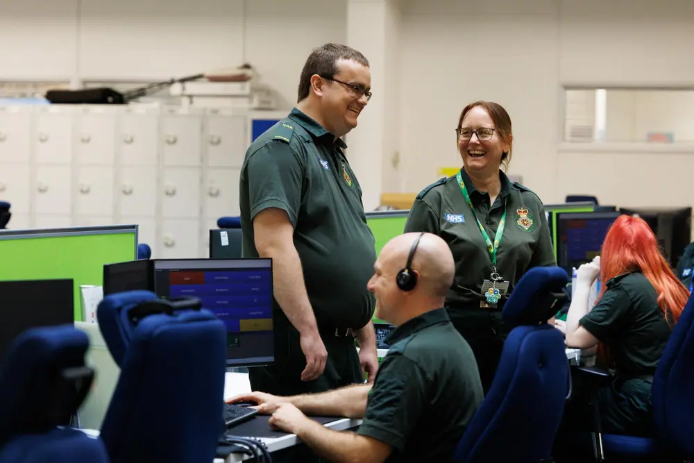 James Goulding, chief clinical information officer at Yorkshire Ambulance Service, with other service members. Photo by Joanne Crawford for Microsoft.