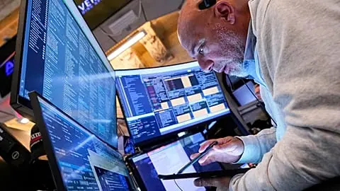 FILE - Markets trading floor