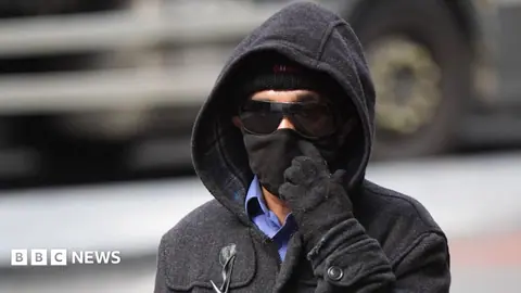 Civil servant who juggled five jobs says he was 'surprised' to be charged with fraud