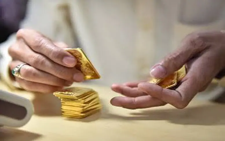 Làm rõ ngưỡng thanh toán không dùng tiền mặt khi mua, bán vàng - Ảnh 1.
